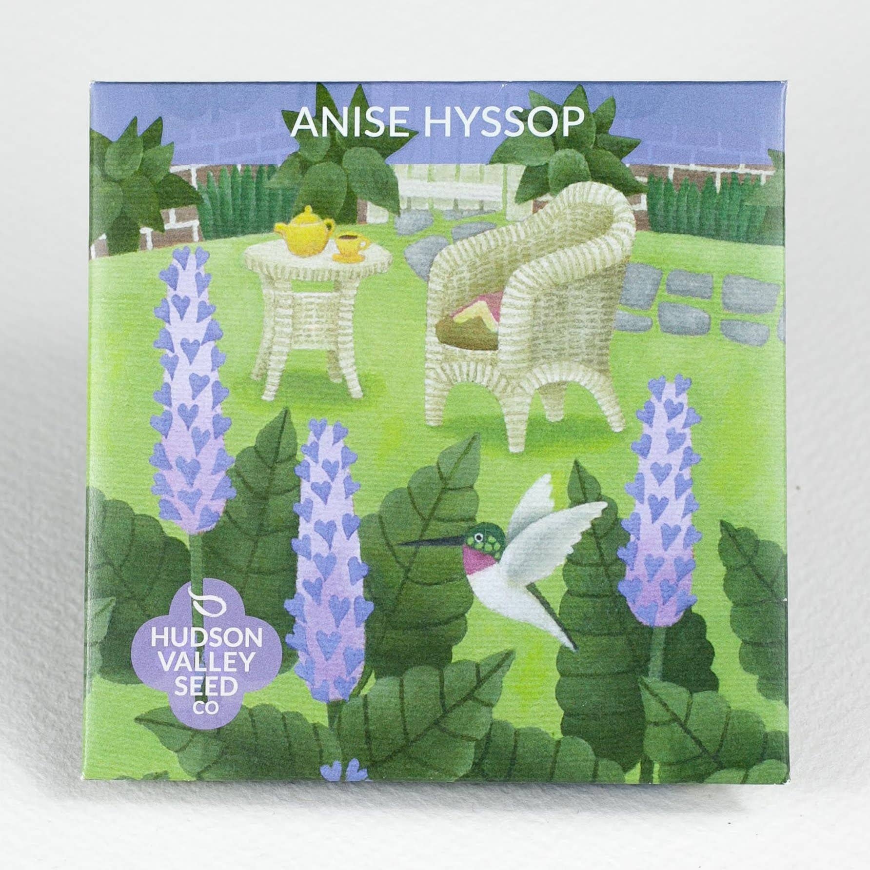 A square illustrated seed packet for Anise Hyssop from Hudson Valley Seed Co., featuring a colorful garden scene with purple flowers, green leaves, a white chair, and a hummingbird.