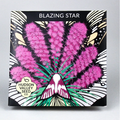 A square seed packet for 'Blazing Star' seeds by Hudson Valley Seed Co, featuring a vibrant graphic illustration of bright pink flowers and a mountain motif on a black background.